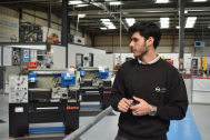 Male apprentice on the workshop floor