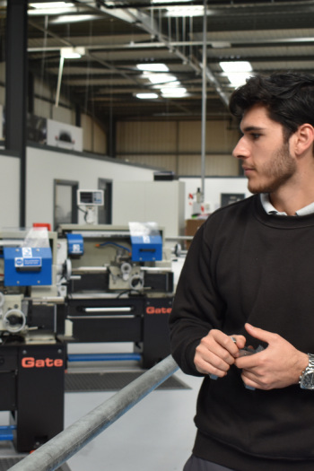 Male apprentice on the workshop floor