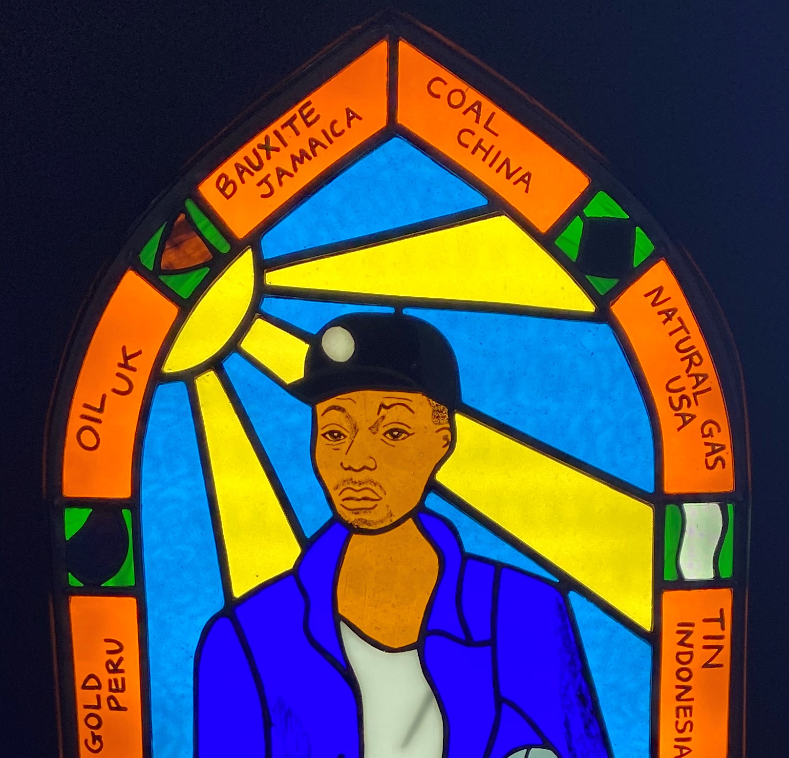 Image of stained glass window of a Black Miner created by artist Stella Chadwick