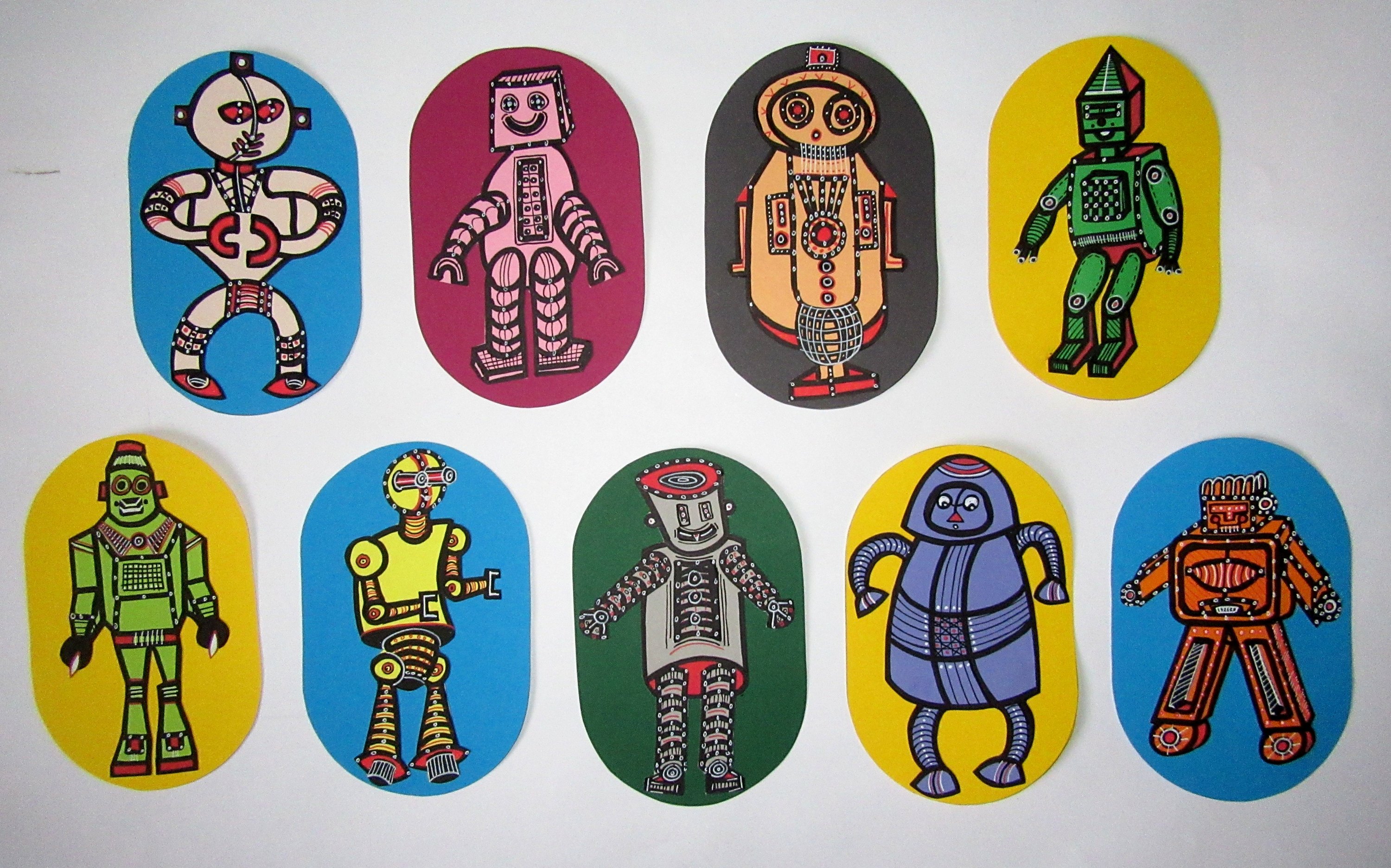 A photo of 9 pieces of coloured card, with a different robot cartoon drawn on each.